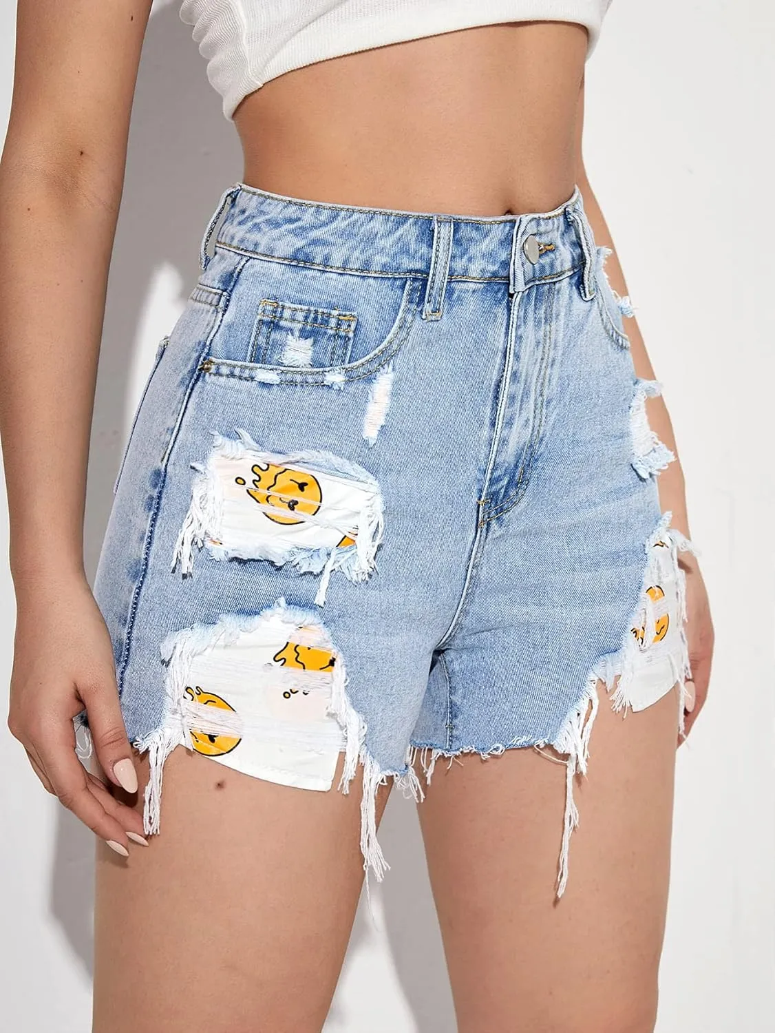 WDIRARA Women's Ripped Raw Hem Shorts Graphic Printed High Waisted Slant Pockets Casual Denim Shorts